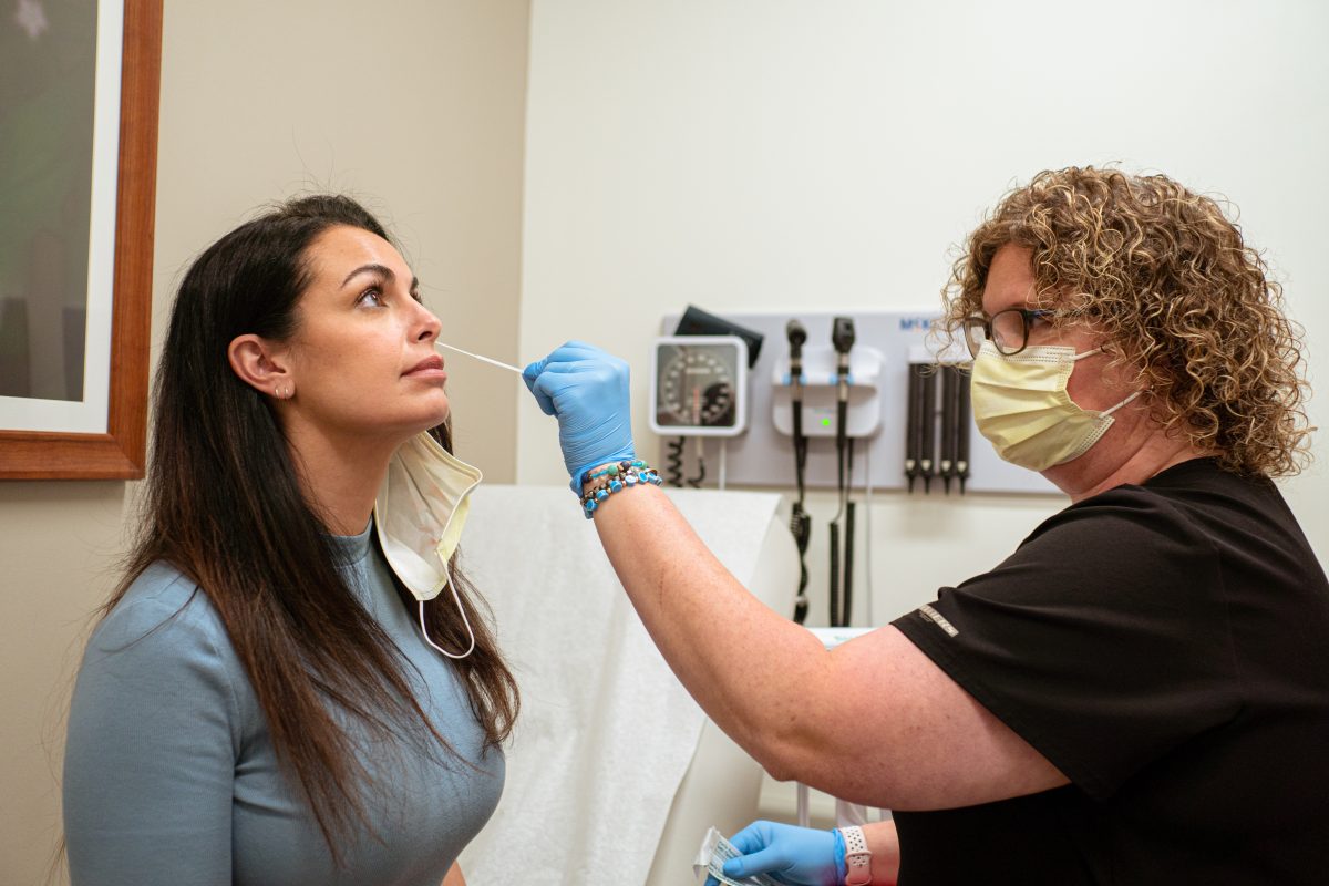 Patient getting COVID-19 test at AFC Huntersville